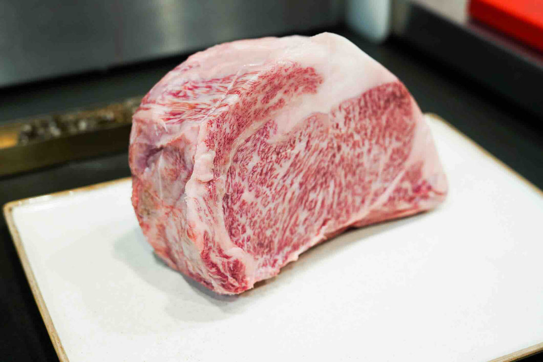 Cross-section image of Wagyu beef showcasing fat marbling patterns